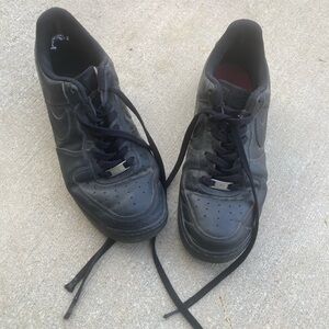 Black Nike Air Force 1 trainers